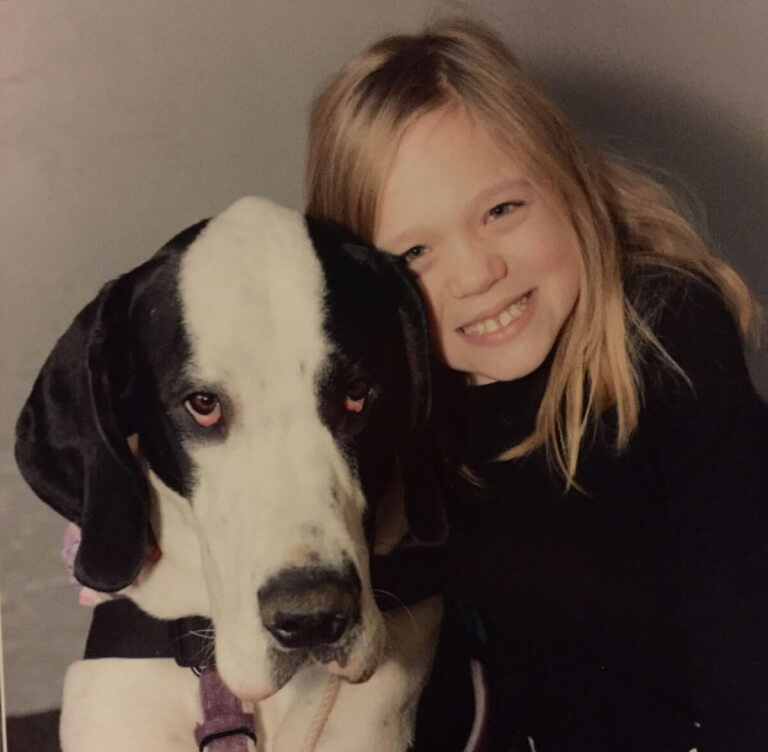 La merveilleuse histoire de Bella, 10 ans et de son chien, aide d'enfants handicapés, George portrait de deux amis